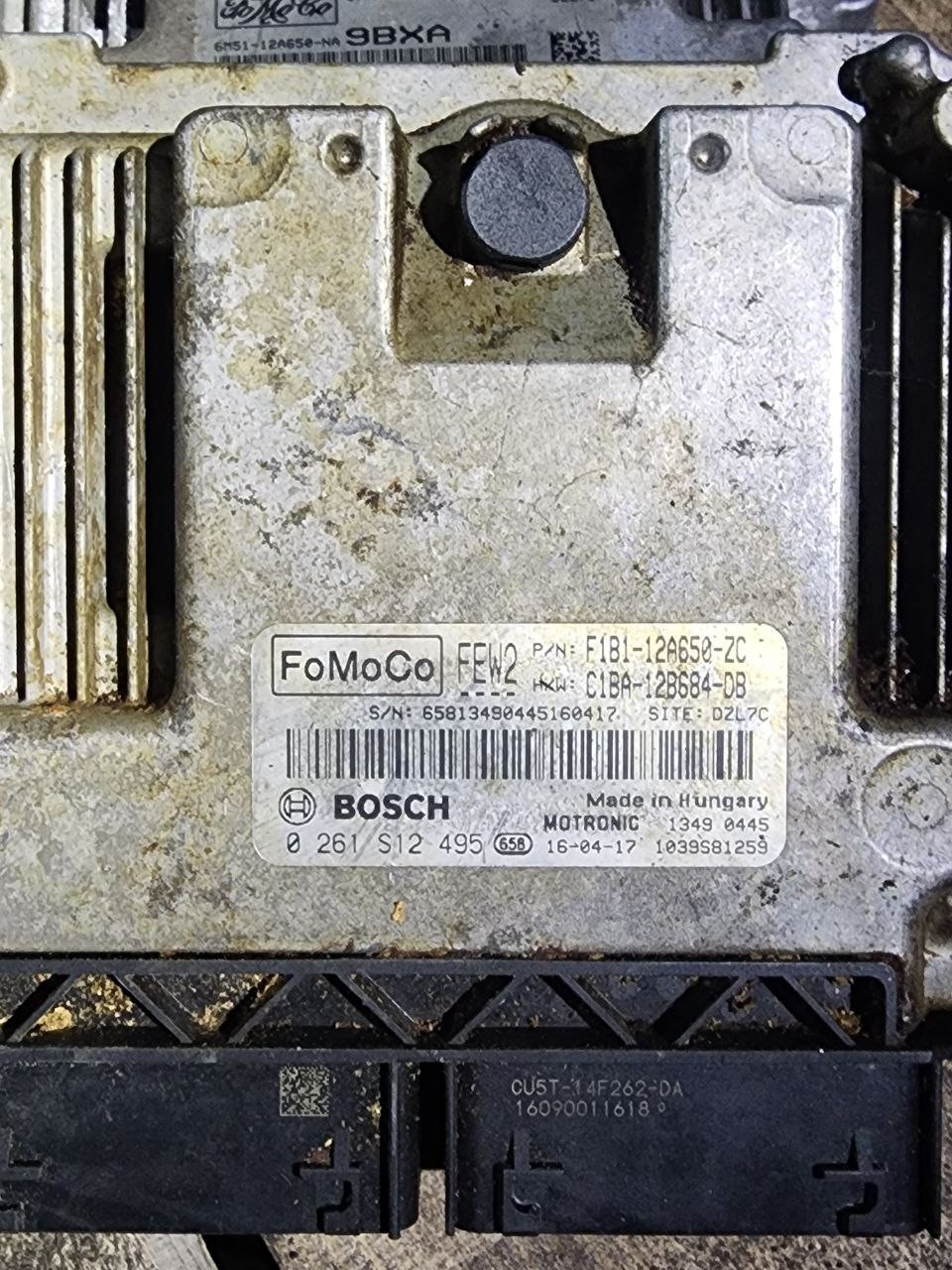 F1B1 12A650 ZC Bosch FEW2 0261S12495 Ford Engine ECU Module